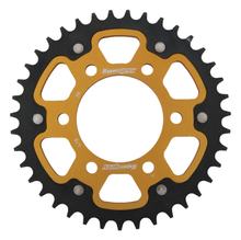 Piñón dorado de aluminio/acero Supersprox Stealth 520 LK 104,0 mm Ø 80 mm 39T con 6 orificios