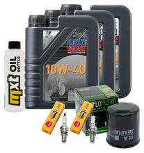 Inspection package 3L 10W-40 + oil filter + 2x spark plug for Kawasaki ER-5 500 ccm Year 2001 - 2006