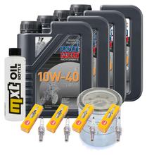 Paquete de inspección 4L 10W-40 + filtro de aceite + 4 bujías para Kawasaki ZX-6R 600 ccm Año 1995 - 1997