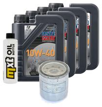 Paquete de inspección 4L 10W-40 + filtro de aceite + 4 bujías para Kawasaki ZX-6R 600 ccm Año 1995 - 1997