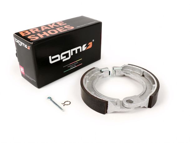 Mâchoires de frein BGM Ø 127x23 mm pour Vespa 8" arrière, 1 support, Vespa Wideframe V1T à V15T (h), V30T à V33T (h), VM (h), VL (h), VB (h), VNA1T à VNA2T (h), VNB1T à VNB3T (h), VBA1T (h) h), VBB1T (h)