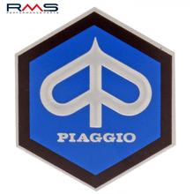 Emblem "Piaggio" 6-hranná kaskáda hliník, samolepící 49x43 mm pro Vespa Sprint / Rally atd.