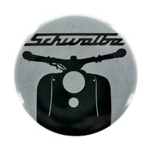 Botão de metal Ø25mm com capa protetora e agulha curva, Motivo: Schwalbe